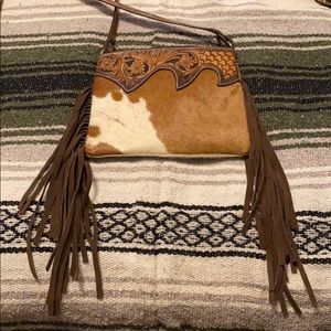 Cowhide and leather tooled crossbody purse